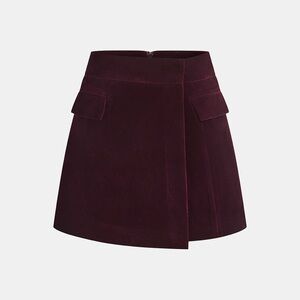 CoMMENSE Velvet asymmetrical mini skirt
COLOR - Burgundy Size Large NWT